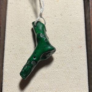 Featuring a Malachite stone